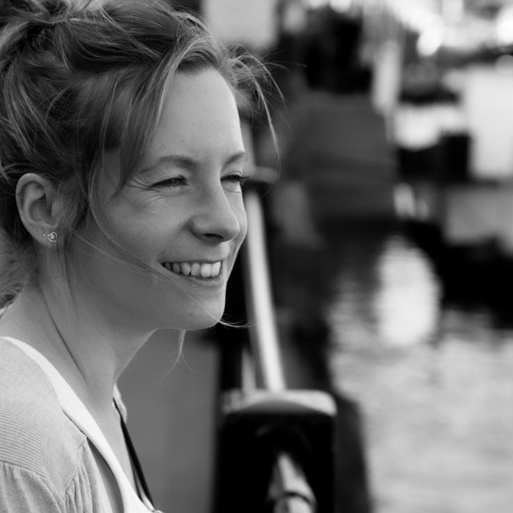 Alex Rivera, Lead Design Curator at Radiant Growth Hub, reviewing corporate floral arrangements